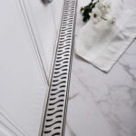 Rigola de interior montate la perete MCH cu rama si gratar de inox HARMONY lucioasa, 750 mm